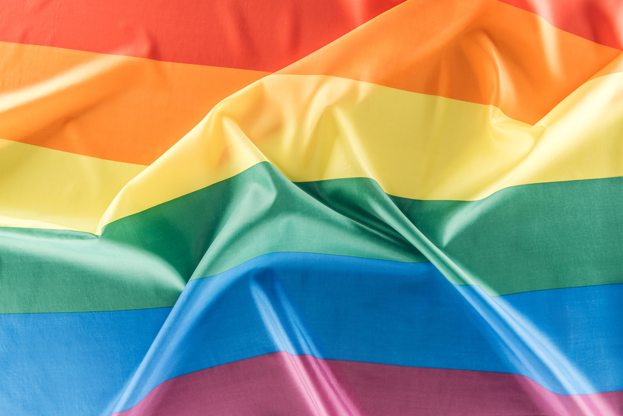 top view of creased lgbt rainbow flag