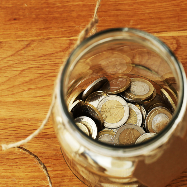 Finances. Euro coins in a jar